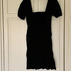 Black puffy sleeve dress. Bodice is rouched
